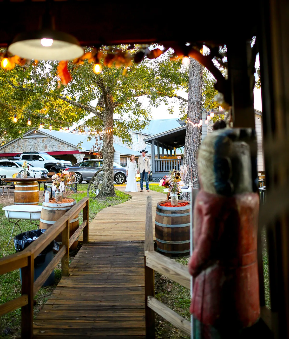 The boardwalk under string lights at dusk